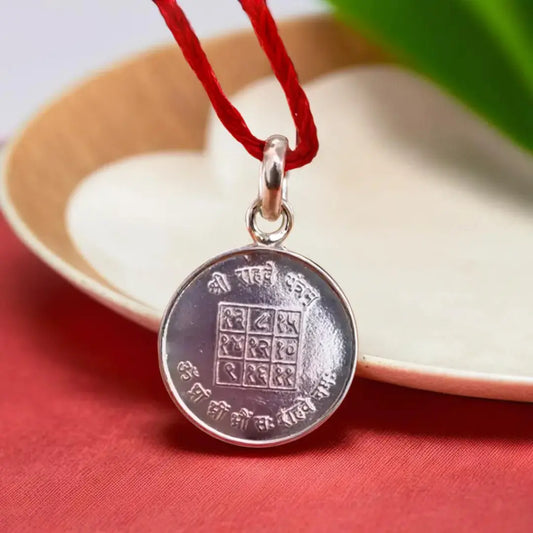 Shri Rahu Yantra Silver Locket (With Thread)